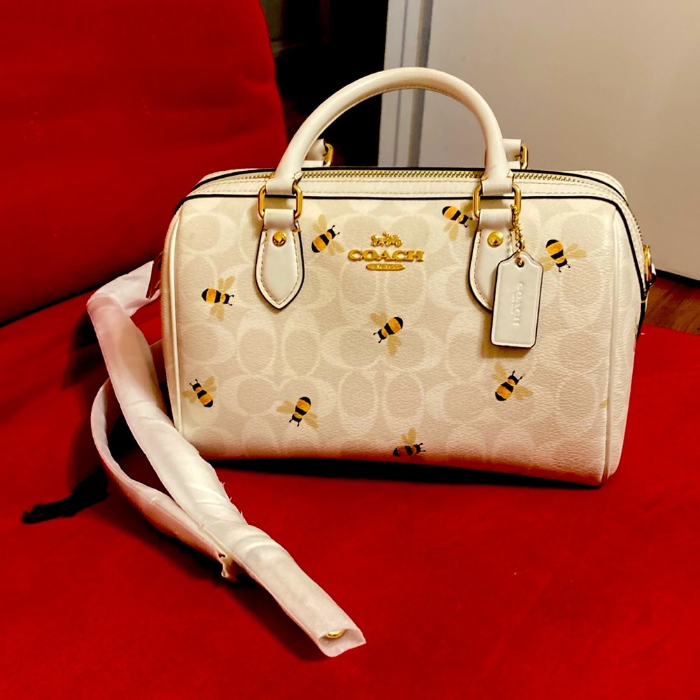 Coach Rowan Satchel in Canvas/Leather Bee Print 
10” (L)x 6 1/2” (H) x 5 1/2 (W)
